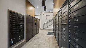Denver apartment for rent - the lockers in the hallway of a building with a staircase at Alton Jefferson Park, Colorado, 80211