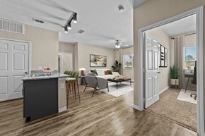 Longview apartment for rent - A kitchen with a dining table and chairs is shown.