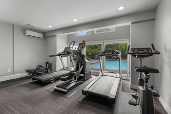 Fitness room with free weights, cardio, and functional trainer