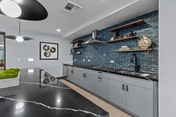 Rooftop lounge with chef's kitchen