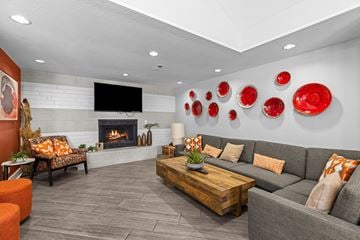 Lynwood apartment for rent - a living room with couches and a fireplace