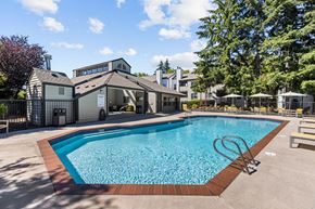 Lynwood apartment for rent - a swimming pool with a house in the background