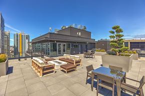 Seattle apartment for rent - O2 Apartments Rooftop Courtyard with Tables and Chairs