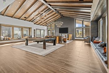Resident clubhouse with fireplace, billiards table and full-service coffee bar