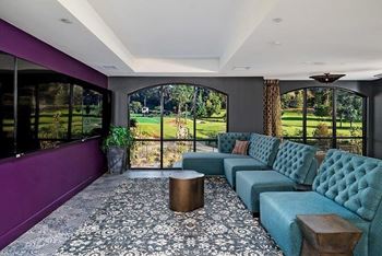 Sultry lounge with private meeting nooks and entertaining kitchen with group seating