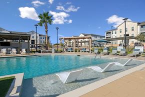 San Marcos apartment for rent - Alta Center Point Apartments in San Marcos, Texas Pool with Lounge Chairs