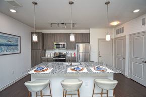 Live Oak apartment for rent - Aspire at Live Oak Kitchen with Island and Countertop Seating