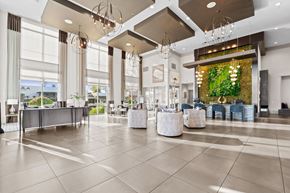 Phoenix apartment for rent - A spacious lobby with a reception desk and seating areas.