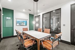 San Antonio apartment for rent - A conference room with a long table and chairs.