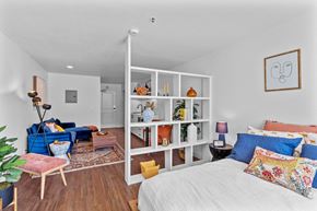 Kennewick apartment for rent - Studio apartment with room divider and living area at The Q Apartments, Kennewick