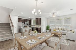 Austin apartment for rent - A dining room with a table set for a meal.