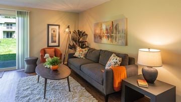 Bremerton apartment for rent - a living room with a couch and a table