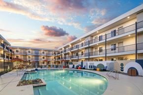 Glendale apartment for rent - Cabana Aldea New Apartments in Glendale, Arizona Exterior and Pool at Dusk