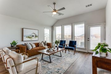 Liberty Hill apartment for rent - a living room with a couch and a ceiling fan