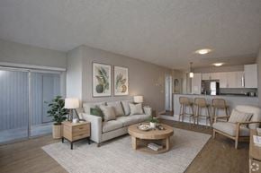Richland apartment for rent - A living room with a couch, chairs, and a coffee table.