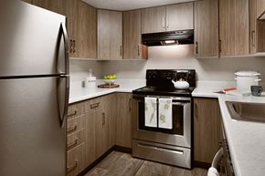 Murray apartment for rent - Clover Creek Apartments Kitchen Stove and Cabinets