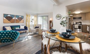 Murray apartment for rent - a living room and kitchen with a dining room table and chairs