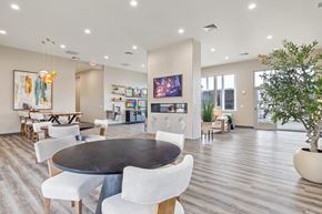 Richland apartment for rent - A modern dining room with a large table and chairs.