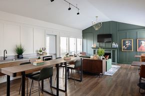Portland apartment for rent - A modern kitchen with a wooden table and chairs.