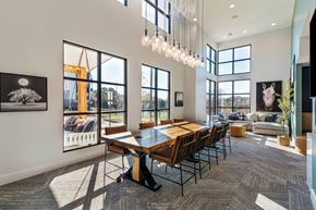 Cane Ridge apartment for rent - A modern dining room with a large table and chairs.