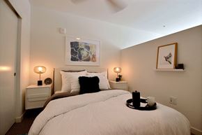 Seattle apartment for rent - Crew Apartments Apartment Home Bedroom Bed and Nightstand