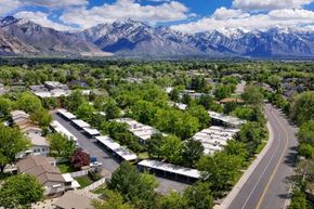 Murray apartment for rent - A suburban area with houses and a mountain range in the background.