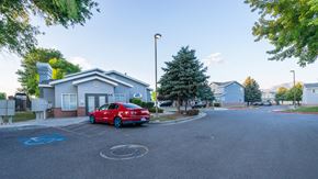 West Jordan apartment for rent - Avion Townhomes Exterior Leasing Office and Parking Lot