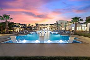 Pflugerville apartment for rent - A large pool with a fountain in the middle of it.