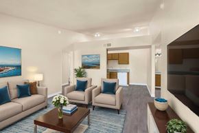 Tucson apartment for rent - A living room with a couch, chairs, and a coffee table.