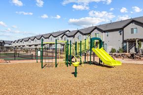 Santa Clara apartment for rent - a playground with yellow and green equipment in front of apartments