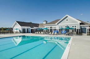 White Plains apartment for rent - EVOLV at Stonehaven Townhomes in White Plains, Maryland Pool with Lounge Chairs