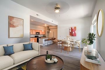 Orem apartment for rent - a living room with a couch and a table