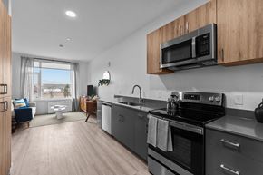 Caldwell apartment for rent - an apartment kitchen with stainless steel appliances and a view of the ocean