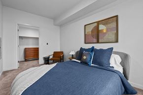 Caldwell apartment for rent - a bedroom with a large bed and a closet