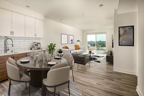 Los Angeles apartment for rent - A modern dining room with a round table and chairs.