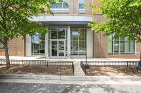 Arlington apartment for rent - A building with a glass door and the number 018 on it.