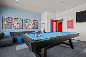Pasco apartment for rent - a games room with a pool table and a tv