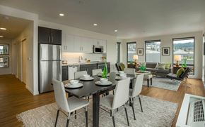 Portland apartment for rent - a kitchen and living room with a table and chairs