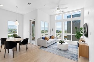 Salt Lake City apartment for rent - A modern living room with a dining table and chairs.