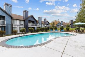Lynnwood apartment for rent - a swimming pool with apartments in the background