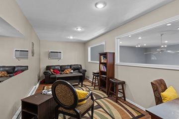 Spokane Valley apartment for rent - a living room with a couch and a table and a window