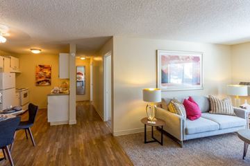 Thornton apartment for rent - A living room with a grey couch and a coffee table.