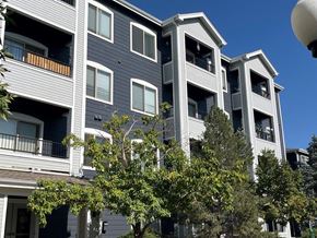 Arvada apartment for rent - a row of houses with trees in front of them