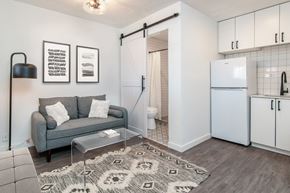 Spokane apartment for rent - a living room with a couch and a coffee table