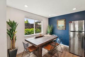 Gresham apartment for rent - A dining room with a wooden table and chairs.