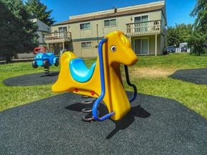 Richland apartment for rent - La Verde Apartments Outdoor Playground with Spring Riders