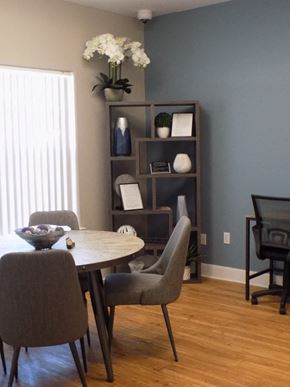 Longmont apartment for rent - Quail Village Apartments Leasing Office Table and Shelves