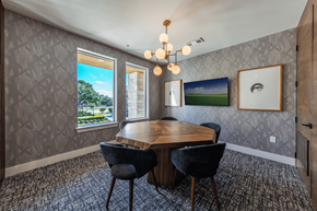 Austin apartment for rent - A dining room with a wooden table and chairs.
