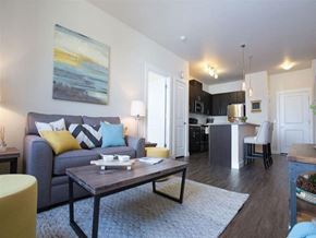 Great Falls apartment for rent - a living room with a couch and a table