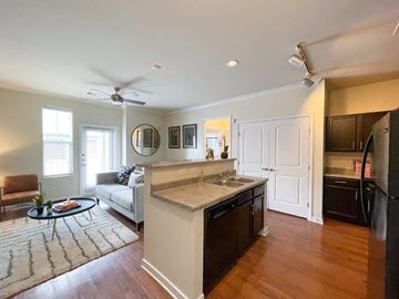 Williston apartment for rent - a living room with a kitchen and a couch